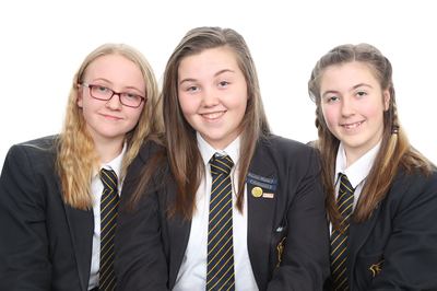 Sibling group school photograph of three sisters