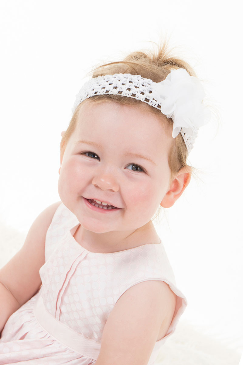 professional headshot photograph of child smiling 